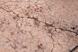 Surface cracking happens while the concrete is still fresh and before it undergoes initial set. Weather conditions not favorable to concrete are the primary cause. The best protection for contractors is to collect on-site ambient weather data and concrete temperatures and use the nomograph to predict whether cracking will occur.