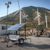 At this remote construction site in Utah, the sun, wind and a battery bank join forces to power security cameras.