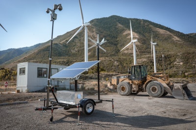 At this remote construction site in Utah, the sun, wind and a battery bank join forces to power security cameras.