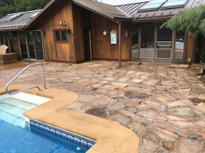 The original flagstone-covered patio/pool surround was in desperate need of an upgrade.