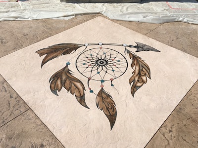 A focal point of the project is a dream catcher design Gera created using a stencil and automotive paint spraying tools.