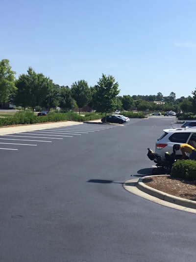 Section size was based on how much sealer their 750-gallon trailer-mounted spray unit could apply in a day, so generally between 30,000 square feet and 40,000 square feet each day. Schedules got bumped when weather interfered but otherwise the production went off as planned.