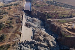 In February of 2017 the California Department of Water Resources opened the spillway on the Oroville Dam to reduce the flood water level of the lake. Rushing water destroyed the center portion of the spillway floor, washed away a section of the spillway wall, and created a 150 deep canyon in the spillway. With the dam at risk in the event of another flood an emergency construction project commenced to replace the spillway and the emergency spillway beside it. Photo Credit: DWR
