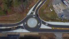 Piedmont Paving waited a state-mandated 14-day period following paving before installing thermoplastic markings. Once the thermoplastic is down they returned and addressed the shoulders and finished any grassing and grading work.