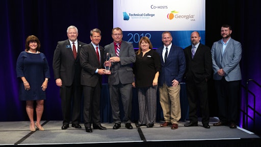 From left: Amy Carter, Deputy Commissioner for Rural Georgia Initiative with Georgia Department of Economic Development; Technical College System of Georgia Commissioner Matt Arthur, Georgia Gov. Brian Kemp, James Suchovsky, Statesboro plant manager of Briggs & Stratton, Amanda See, human relations manager, and other Briggs & Stratton employees.