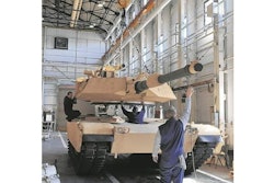 The $5.2 million for Anniston Army Depot (mechanics shown working in Anniston on an M1 Abrams tank) to build a weapons maintenance shop that was due to be awarded in March 2020 could be cut to fund Trump's border wall.