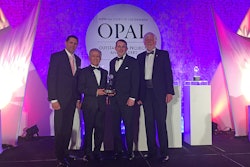 Representatives of the State Route 99 project receiving the trophy at the ASCE Gala include, from the left: Brian Nielson, Alaska Way Project Manager from WashDOT; Saiid Saiidi of the University of Nevada, Reno; Jed Bingle, the design engineer for SR-99 (Formerly at WashDOT); and Roger Millar, the Washington State Secretary of Transportation.