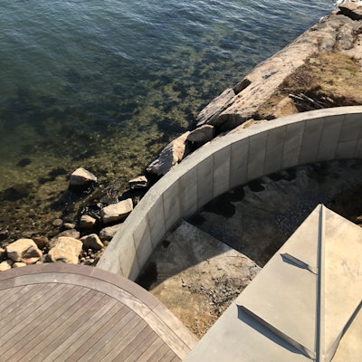 The concrete retaining wall brings guests up close and personal with the lake.