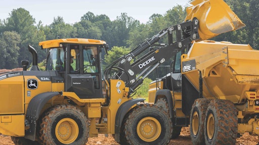 For its mid-size L-Series wheel loaders John Deere updated its pilot hydraulic controls to EH controls.