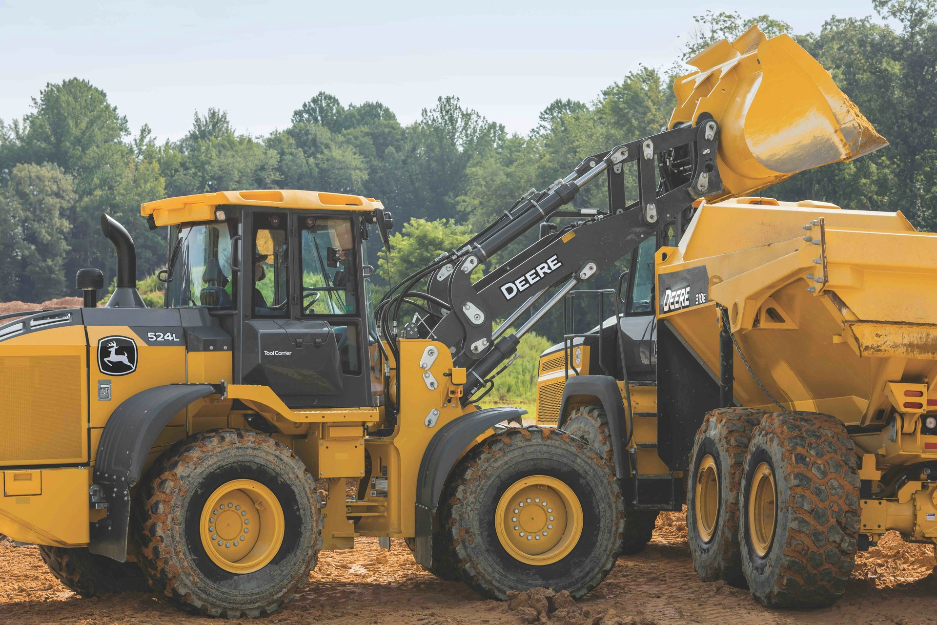 Implements for front loaders, wheel loaders and other tool carriers