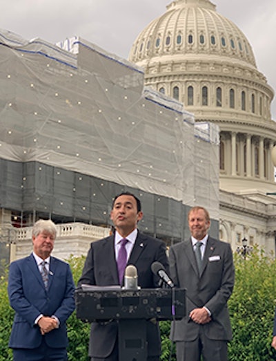 Michael Vazquez (center), MECO Miami, Inc., spoke during a Capitol Hill press conference.