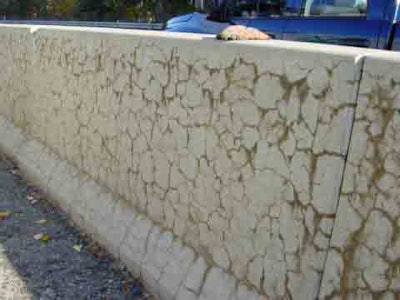 Characteristic crack pattern associated with the alkali–silica reaction in a concrete barrier step along a state highway near Leominster, Mass.