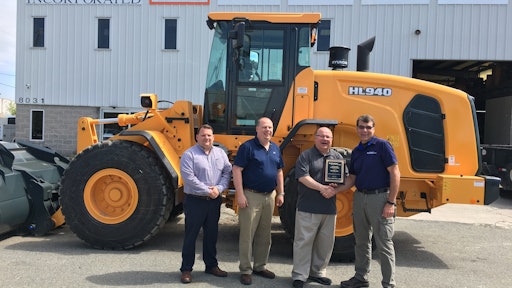 From left, Ryan Correlli, general manager; Bill Correlli, sales and parts manager; Patrick Correlli, president; Bill Klein, HCEA district manager–Northeast.