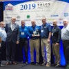 From left, Bill Mabeus, Fishman, executive vice president; Jeff Johnson, MAPEI business manager, FCIS); Allen Janofsky, MAPEI sales representative; Vince Linton, MAPEI sales representative; David Kocienda, MAPEI sales representative; Lee Tindall, MAPEI business development leader; and Bob Wagner, Fishman president and CEO.