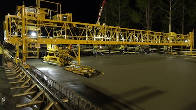 Superior Construction set a 60- to 70-cu.-yd./hour production target, but the remote-controlled paver has helped to increase production to 100 cu. yds./hour.