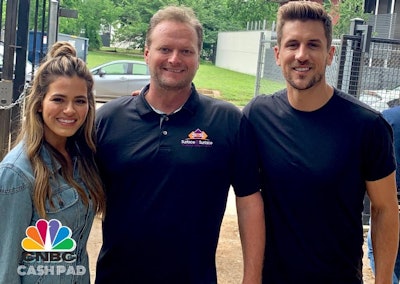 The popularity of epoxy flooring systems is growing thanks to exposure on TV shows such as Garage Rehab and Cash Pad. From left, JoJo Fletcher, Keith Kimberlin and Jordan Rodgers on the set of Cash Pad.