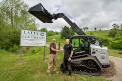 Chad Latta (left), Latta Earthworks, is congratulated by JCB regional business manager, Will Turner.