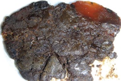 This grease image shows extreme thickening that resulted from copper prematurely oxidizing the base oil in the grease.