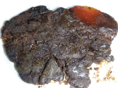 This grease image shows extreme thickening that resulted from copper prematurely oxidizing the base oil in the grease.