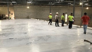 Installing wet cure blankets.