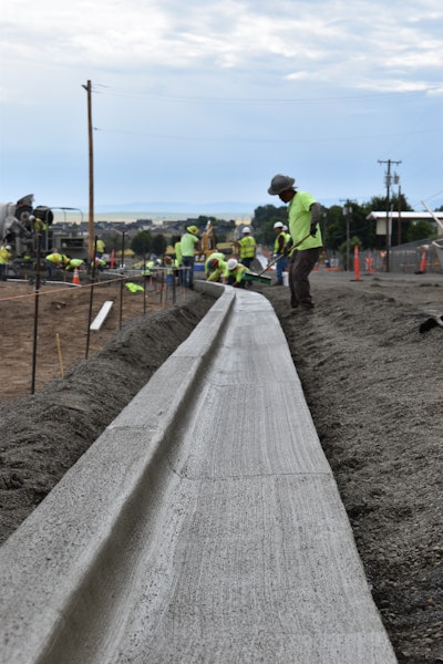 Curb machines eliminate much of the manual finishing work, so that the crew just has to do a little finessing with a broom and brush.
