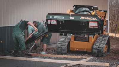 The Danuser Mega Mixer allows operators to mix, scoop and dispense a variety of materials, including bag-mix concrete. Some of the latest changes to the Mega Mixer include an 8-in. diameter and an 8-in. pitch steel auger for faster mixing and dispensing.