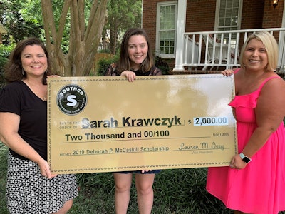 Sarah Krawczyk (center), 2019 recipient of WSA's Dale McCaskill Sr. Memorial Scholarship, accepts an additional scholarship offering from Southco Sweeping with her mom Sarah (left) and Lauren Ivey, vice president of Southco Sweeping.