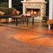 Pictured, an outdoor living space where acid stains were used to etch the concrete surface.