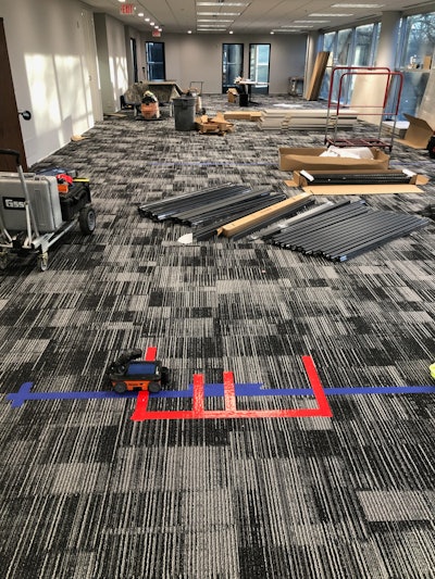 GPR scan of a commercial space. Red marks indicate the location of post-tension cables.