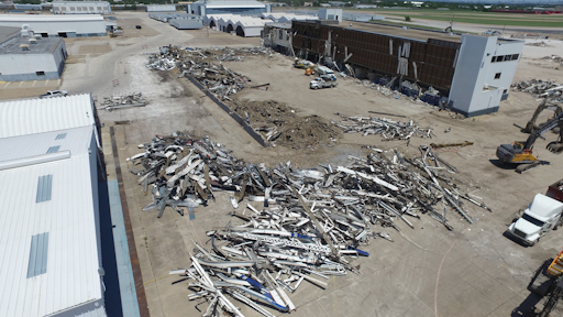 The fast track abatement schedule by 1 Priority was immediately followed by demolition of the structures. Demolition also included salvage of remaining equipment and recycling of metals.