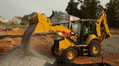 Tariffs on EU goods, such as backhoes and other heavy machinery, are being imposed by the U.S.