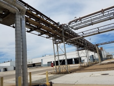 In addition to the flooring, fireproofing, walls and ceilings that required abatement within the interior of the buildings, thousands of feet in asbestos-insulated piping was removed from tunnels and pipe racks that connected each building.