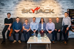 Skyjack team poses with awards won from solutions like ELEVATE