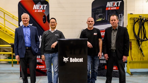 From left to right: Mike Ballweber, president Doosan Bobcat North America; Scott Park, CEO Doosan Bobcat; Mike Kiefer, site operations manager, Litchfield; Jim Flynn, vice president of operations, Doosan Bobcat North America.