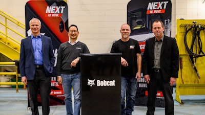 From left to right: Mike Ballweber, president Doosan Bobcat North America; Scott Park, CEO Doosan Bobcat; Mike Kiefer, site operations manager, Litchfield; Jim Flynn, vice president of operations, Doosan Bobcat North America.