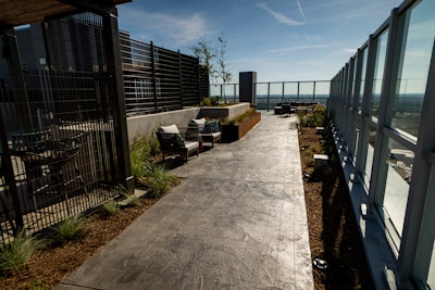 Lumen high-rise condominium project used SUNDEK’s Sun Stone overlay patterning system to provide a decorative finish over the building's structural concrete. Outdoor common areas on the 7th and 32nd floors received the treatment.