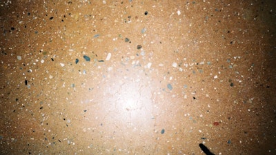Close-up view of aggregate and acid stain.