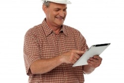 Construction Worker With Tablet Freedigitalphotos