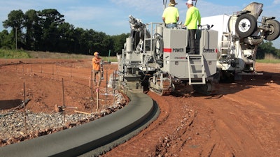 Quick set up time, ability to pour radii and with minimal tie-ins at catch basins are bigger factors in productivity than purely machine speed