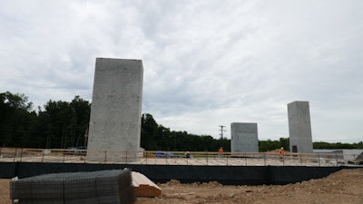 Made of steel, the Rapid Form Bracket takes the place of lumber supports in the construction of elevated slabs.