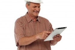 Construction Worker With Tablet Freedigitalphotos