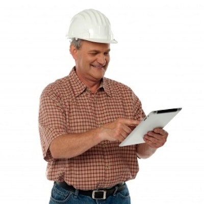 Construction Worker With Tablet Freedigitalphotos