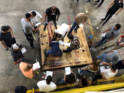 A demonstration of maintenance, repair, rehabilitation, and strengthening of a structure.
