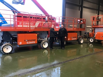 Karsten Haahr, of KH Lift ApS (left) hands over the Electric Speed Levels to Poul Steiness (right) of Steiness Liftcenter ApS in Denmark.