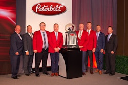Peterbilt recognizes TLG Peterbilt as 2019 Peterbilt Dealer of the Year. From left to right Peyton Harrell (Peterbilt), Robert Woodall (Peterbilt), Kory Larson (TLG), Glenn Larson (TLG), Kyle Larson (TLG), Mike Headley (TLG), Jason Skoog (Peterbilt) and Leon Handt (Peterbilt).