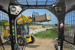 The operator's cab-view from the SW32 skid steer.