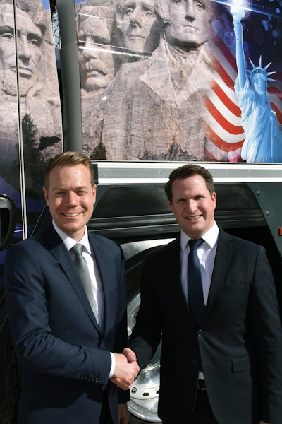 Daniel Pitzer (left) handing over the U.S. market responsibility for mobile cranes to Pierre Bilgeri (right).