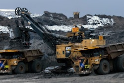 Two Cat 797 F Autonomous Trucks Being Loaded In Pit 5eaad518390a0