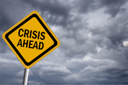 Crisis Ahead Road Sign