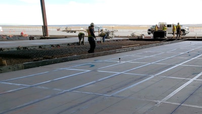 The soil was compacted, covered with 1-inch rock, and the rigid foam was laid flat on top of it.